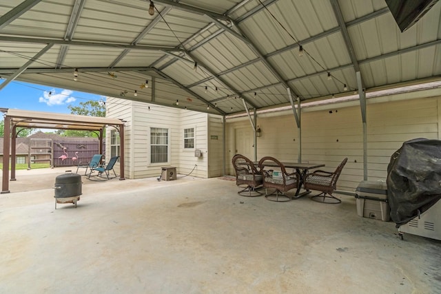 garage with fence
