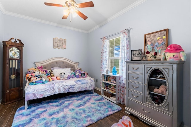 bedroom with a ceiling fan, ornamental molding, and dark wood-style flooring