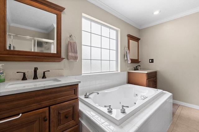 full bath with crown molding, a shower stall, tile patterned floors, a sink, and a whirlpool tub