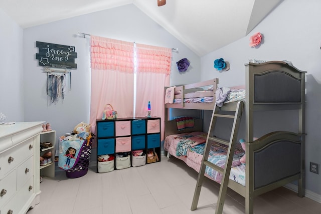 bedroom featuring vaulted ceiling