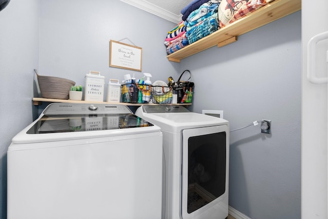 laundry area with separate washer and dryer and laundry area