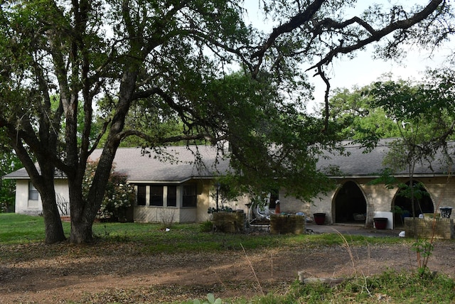 single story home with brick siding