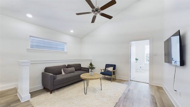 9616 Habitat St, Houston, TX 77075 - living room with light wood finished floors, baseboards, recessed lighting, a ceiling fan, and high vaulted ceiling