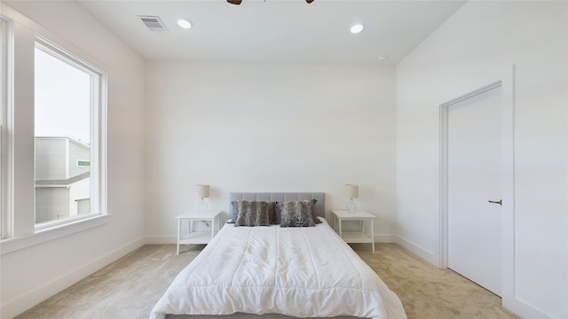 9628 Habitat St, Houston, TX 77075 - bedroom featuring recessed lighting, light carpet, visible vents, and baseboards