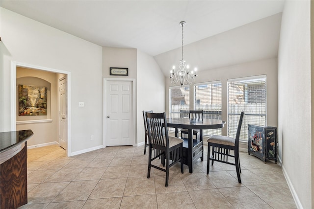 2230 Dali Ln, Missouri City, TX 77459 - dining room featuring light tile patterned flooring, an inviting chandelier, baseboards, and lofted ceiling