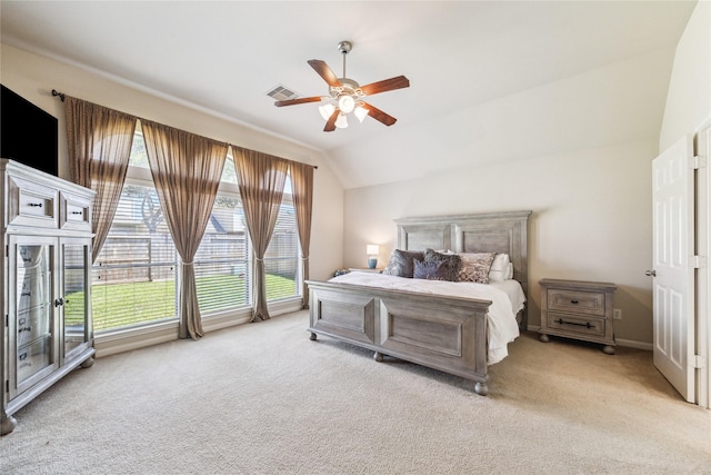 2230 Dali Ln, Missouri City, TX 77459 - bedroom with a ceiling fan, light carpet, vaulted ceiling, and visible vents