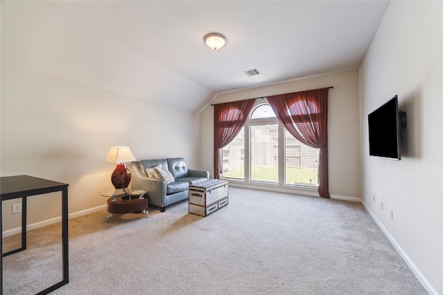 2230 Dali Ln, Missouri City, TX 77459 - sitting room with carpet flooring, visible vents, baseboards, and vaulted ceiling