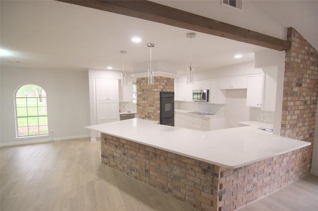 2807 Balmorhea Ave, Houston, TX 77039 - kitchen featuring black appliances, visible vents, light wood-type flooring, and white cabinetry