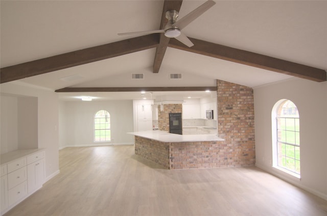 2807 Balmorhea Ave, Houston, TX 77039 - unfurnished living room with light wood finished floors, a ceiling fan, and visible vents