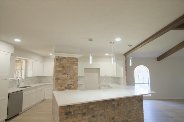 2807 Balmorhea Ave, Houston, TX 77039 - kitchen with light wood-style flooring, dishwasher, decorative backsplash, and a sink
