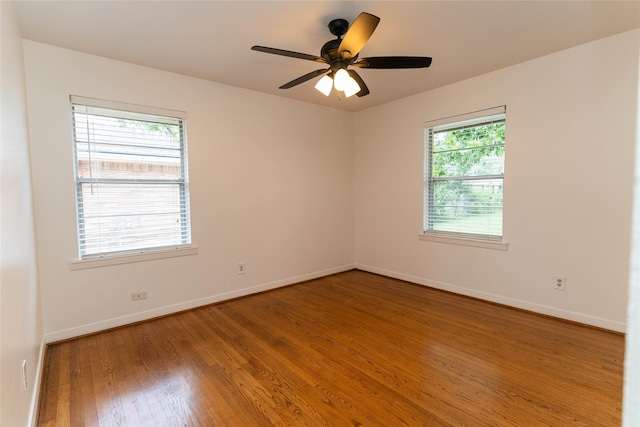2315 Poinciana Dr, Houston, TX 77018 - unfurnished room with baseboards, wood finished floors, and ceiling fan