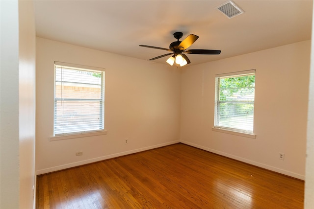 2315 Poinciana Dr, Houston, TX 77018 - unfurnished room featuring baseboards, ceiling fan, visible vents, and hardwood / wood-style flooring