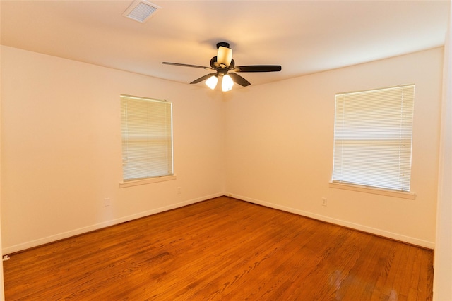 2315 Poinciana Dr, Houston, TX 77018 - unfurnished room featuring a ceiling fan, wood finished floors, baseboards, and visible vents