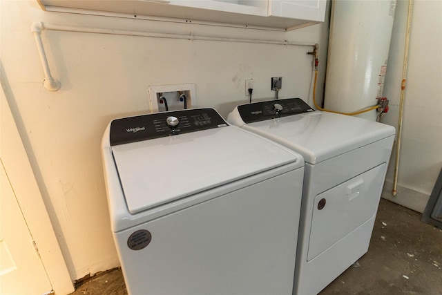 2315 Poinciana Dr, Houston, TX 77018 - clothes washing area with separate washer and dryer and laundry area
