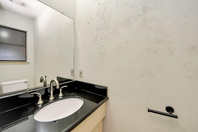 901 Millstone Ct, Sugar Land, TX 77498 - bathroom with vanity and toilet