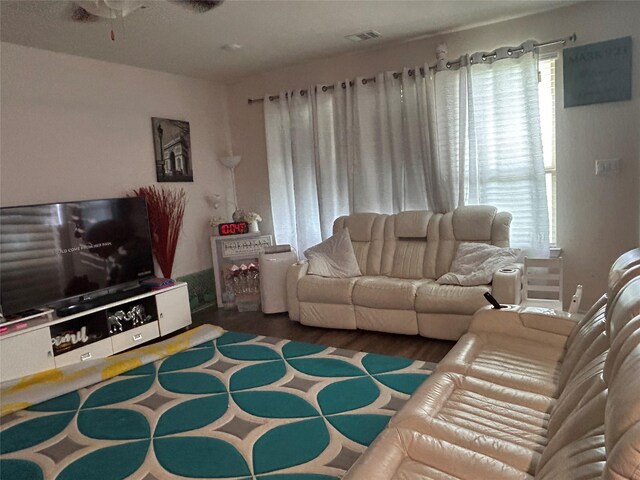 20334 Fossil Valley Ln, Cypress, TX 77433 - living area featuring ceiling fan, plenty of natural light, visible vents, and wood finished floors