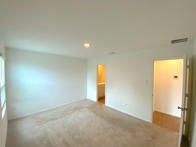 21015 Longeni Dr, New Caney, TX 77357 - carpeted empty room with baseboards and recessed lighting
