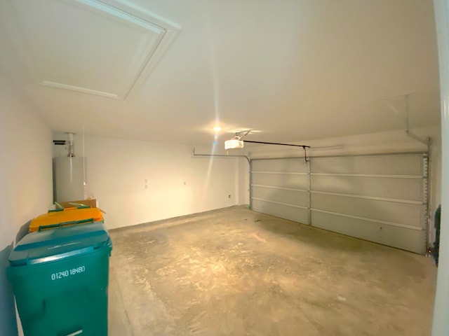 21015 Longeni Dr, New Caney, TX 77357 - garage with water heater and a garage door opener