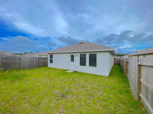 21015 Longeni Dr, New Caney, TX 77357 - back of property with roof with shingles