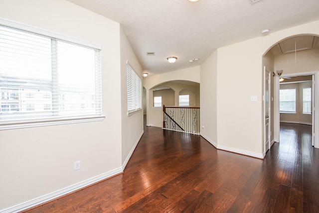 3315 Tulip Ranch Dr, Katy, TX 77494 - hallway featuring attic access, wood finished floors, baseboards, and an upstairs landing