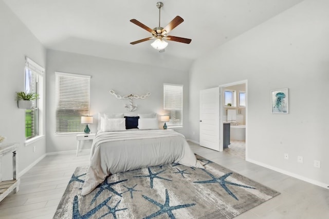 250 Peninsula Point Dr, Montgomery, TX 77356 - bedroom featuring vaulted ceiling, baseboards, light wood-style flooring, ensuite bath, and ceiling fan