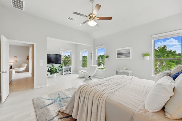 250 Peninsula Point Dr, Montgomery, TX 77356 - bedroom with vaulted ceiling, light wood-style flooring, baseboards, and ceiling fan