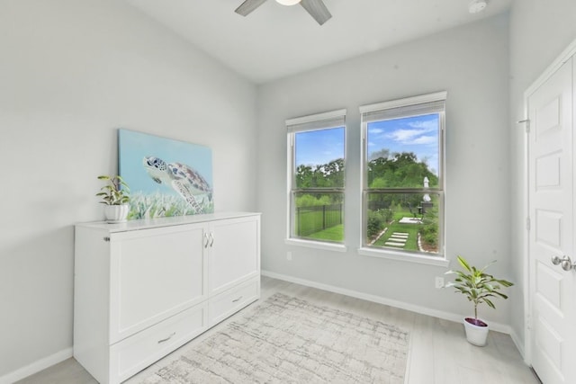 250 Peninsula Point Dr, Montgomery, TX 77356 - entryway featuring a ceiling fan, light wood-style flooring, and baseboards