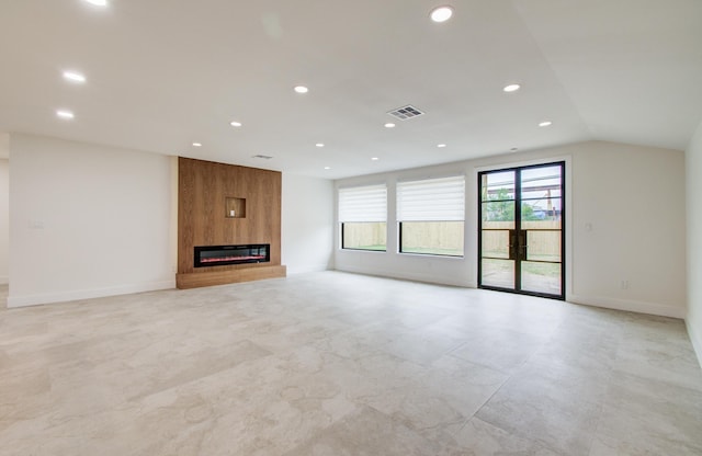 unfurnished living room featuring recessed lighting, baseboards, visible vents, and a fireplace