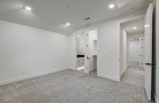 unfurnished bedroom featuring recessed lighting, baseboards, visible vents, and light carpet