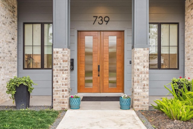 739 Azaleadell Dr, Houston, TX 77018 - doorway to property featuring elevator and covered porch