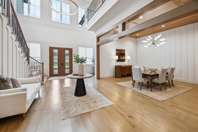 739 Azaleadell Dr, Houston, TX 77018 - entrance foyer with a towering ceiling, french doors, wood finished floors, and a chandelier