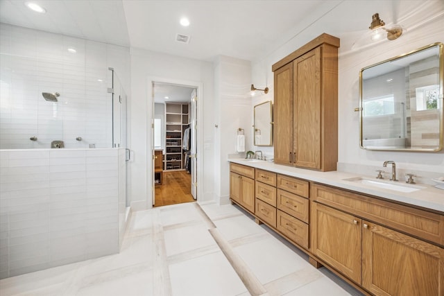 739 Azaleadell Dr, Houston, TX 77018 - full bathroom featuring recessed lighting, a shower stall, double vanity, a sink, and a spacious closet