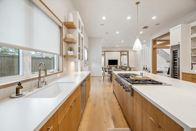 739 Azaleadell Dr, Houston, TX 77018 - kitchen with appliances with stainless steel finishes, modern cabinets, and a sink