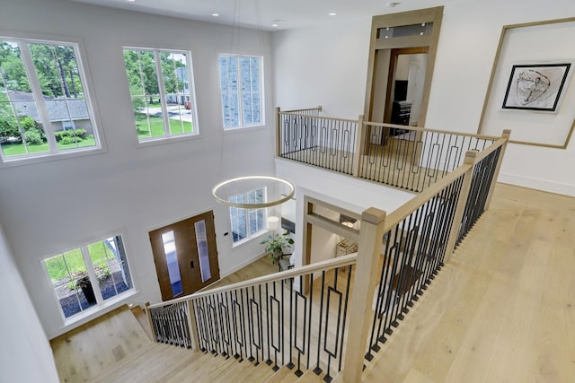 739 Azaleadell Dr, Houston, TX 77018 - stairway featuring a wealth of natural light, wood finished floors, recessed lighting, and baseboards
