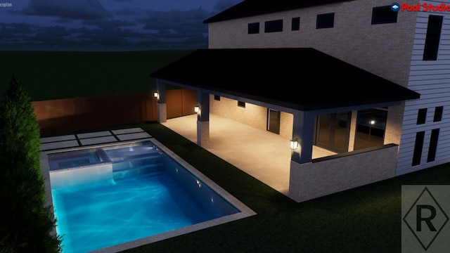 739 Azaleadell Dr, Houston, TX 77018 - pool at night featuring a patio and an in ground hot tub