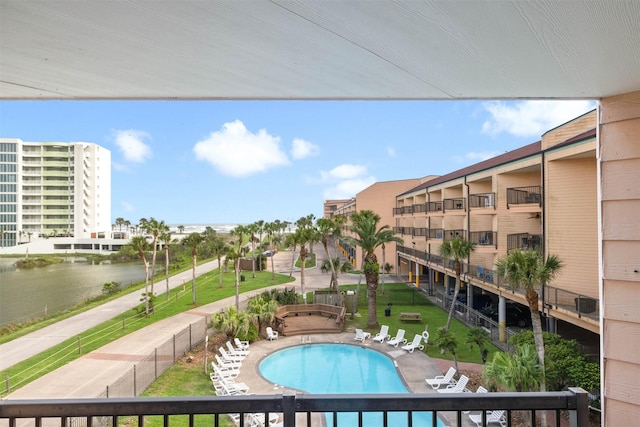 9520 Seawall Blvd Unit 254, Galveston, TX 77554 - community pool featuring a patio area, a water view, and fence