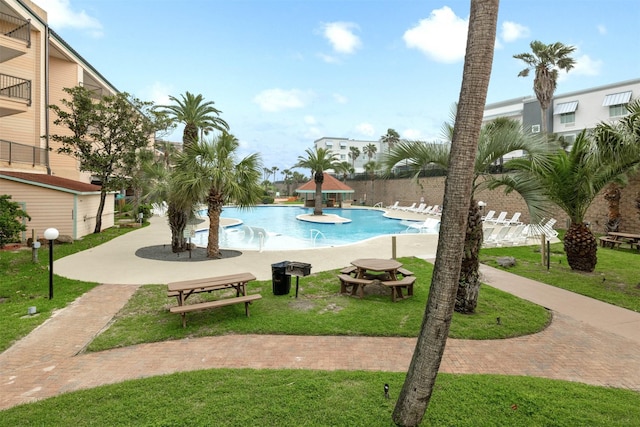 9520 Seawall Blvd Unit 254, Galveston, TX 77554 - view of home's community featuring a yard and a swimming pool