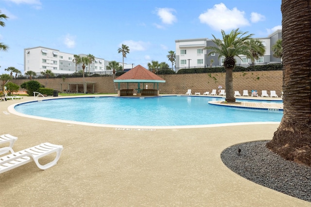 9520 Seawall Blvd Unit 254, Galveston, TX 77554 - community pool with a gazebo, fence, and a patio area