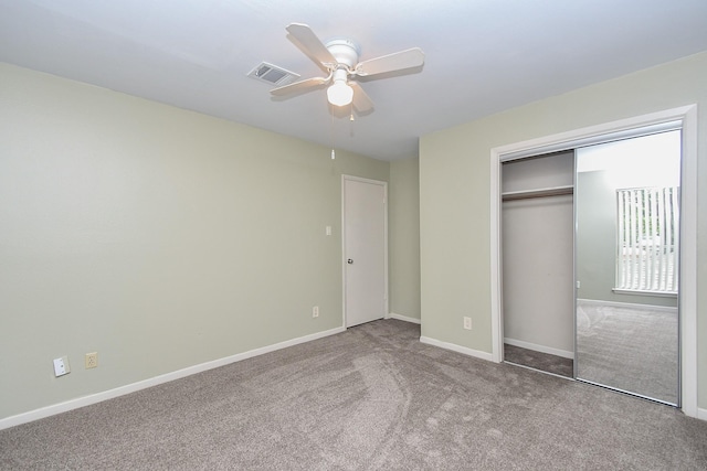 2918 Manila Ln, Houston, TX 77043 - unfurnished bedroom with carpet, a closet, baseboards, and a ceiling fan