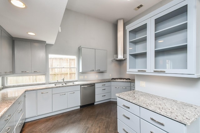 2918 Manila Ln, Houston, TX 77043 - kitchen with appliances with stainless steel finishes, a sink, wall chimney exhaust hood, light stone counters, and recessed lighting