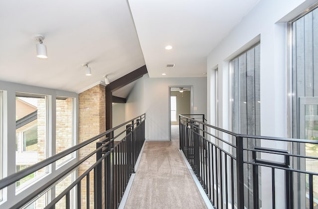 2918 Manila Ln, Houston, TX 77043 - corridor with carpet and an upstairs landing