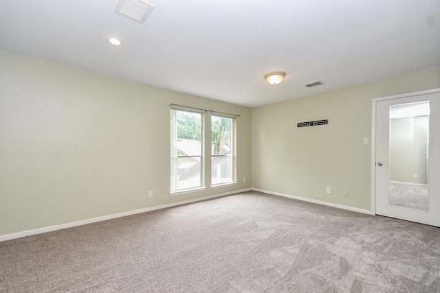 2918 Manila Ln, Houston, TX 77043 - carpeted spare room featuring baseboards and recessed lighting