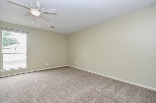 2918 Manila Ln, Houston, TX 77043 - empty room featuring carpet floors, ceiling fan, and baseboards