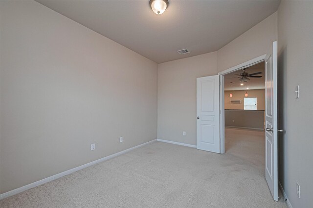 2402 Ivory Ct, Texas City, TX 77591 - spare room with baseboards, visible vents, and light colored carpet