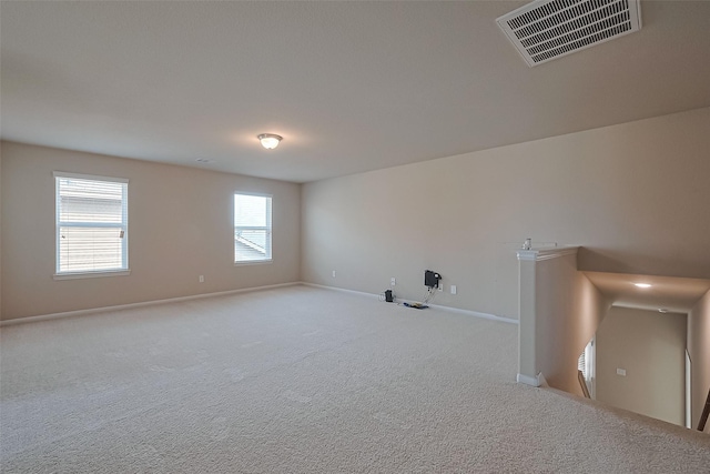 2402 Ivory Ct, Texas City, TX 77591 - carpeted empty room featuring baseboards and visible vents