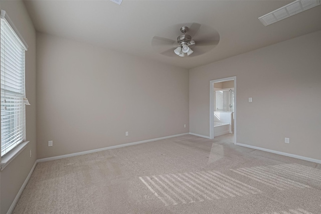 2402 Ivory Ct, Texas City, TX 77591 - spare room featuring visible vents, baseboards, light colored carpet, and ceiling fan