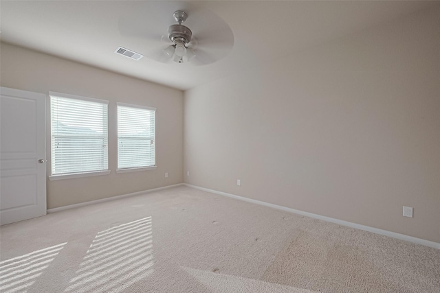 2402 Ivory Ct, Texas City, TX 77591 - spare room featuring baseboards, visible vents, carpet floors, and a ceiling fan