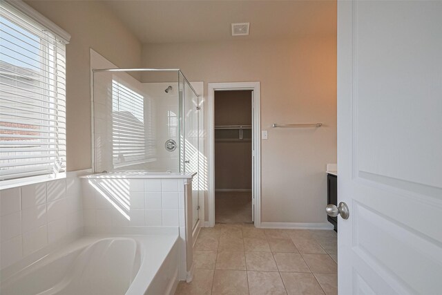 2402 Ivory Ct, Texas City, TX 77591 - bathroom with a garden tub, visible vents, a stall shower, and tile patterned flooring