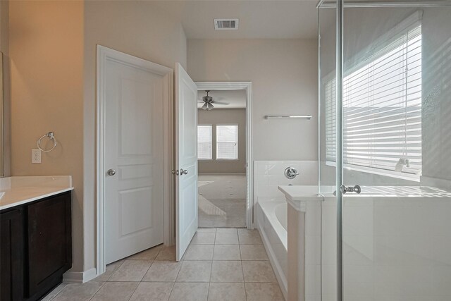 2402 Ivory Ct, Texas City, TX 77591 - bathroom featuring a bath, visible vents, ceiling fan, vanity, and tile patterned flooring