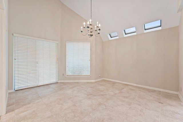 3708 Masters Ct, League City, TX 77573 - tiled empty room with high vaulted ceiling, a skylight, a chandelier, and baseboards